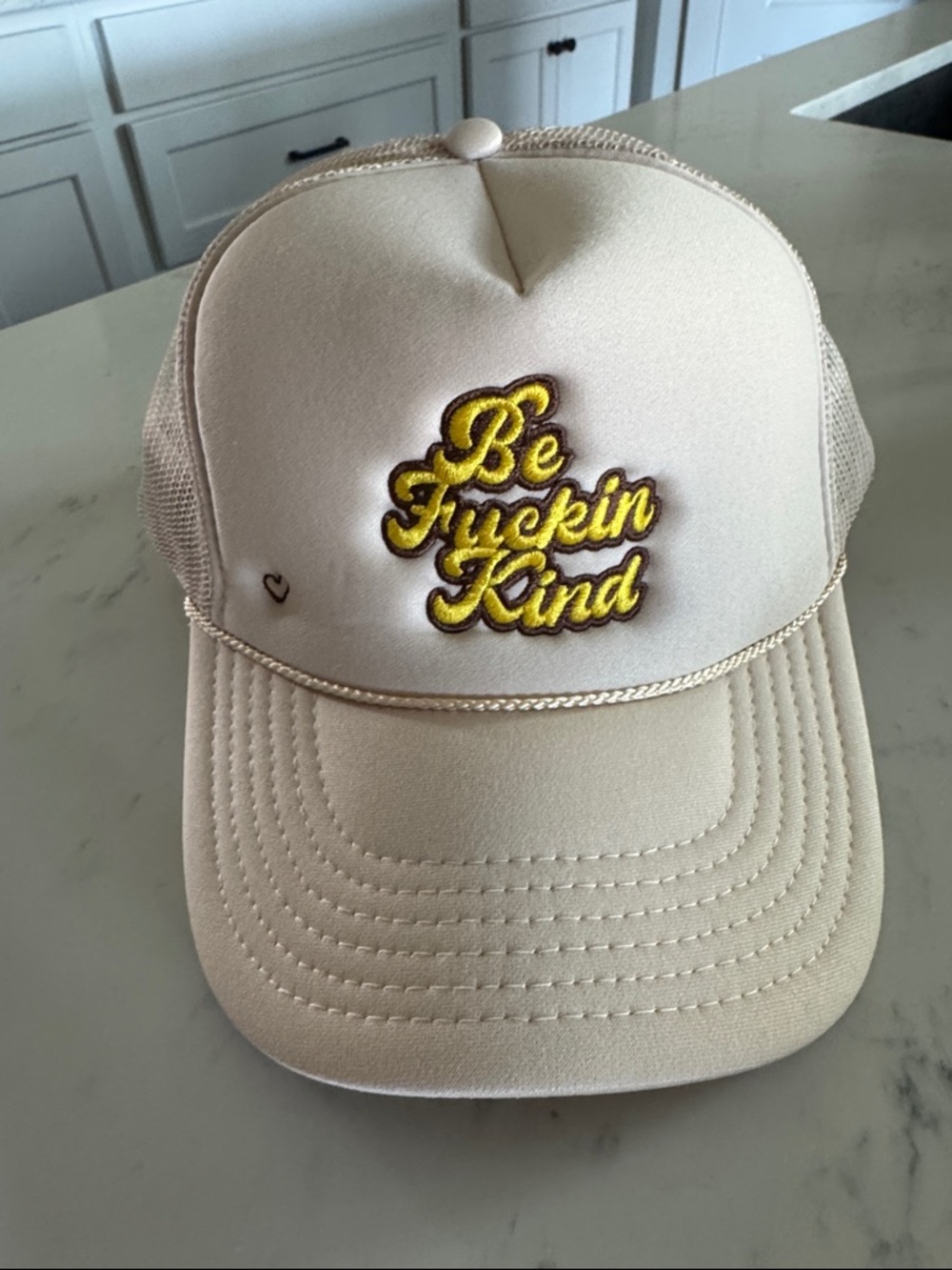 LaLaLand Coffee Cream Trucker Hat with Yellow Embroidered Script - Be Kind